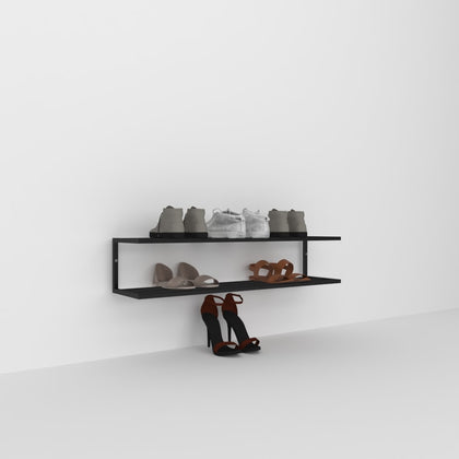 A black wall-mounted 2-tier shoe storage shelf in a minimalist design, featuring casual and formal shoes, photographed against a plain white background for a clean and modern look.