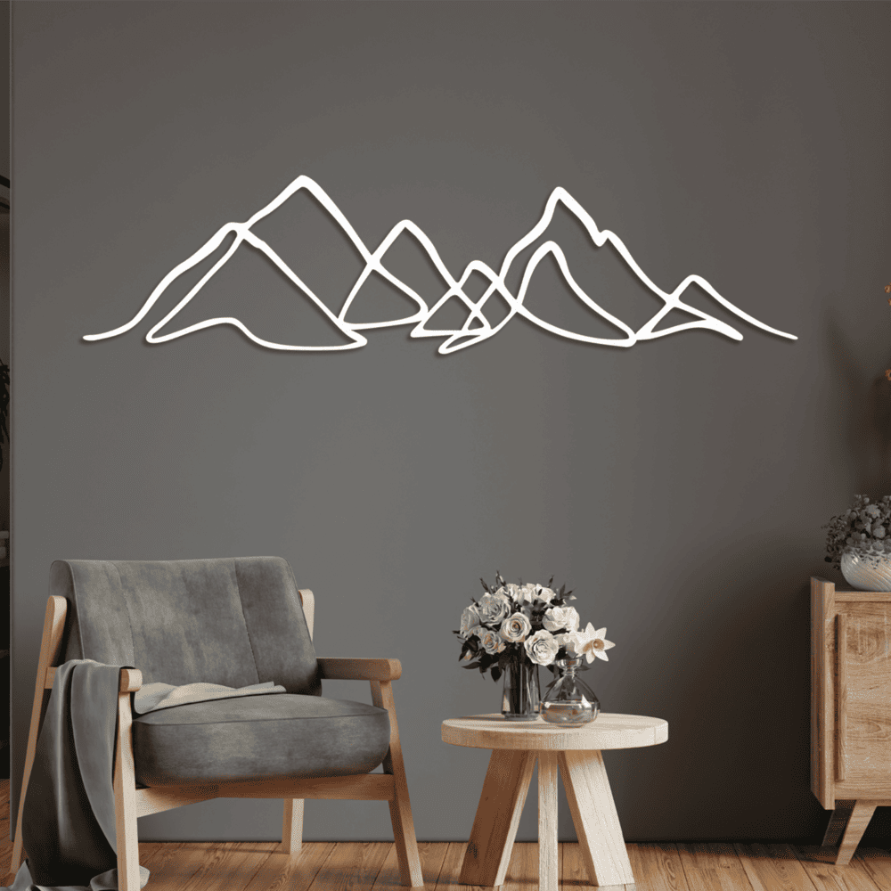 Minimalist metal mountain line art decor displayed on a living room wall, enhancing the space with nature-inspired elegance.