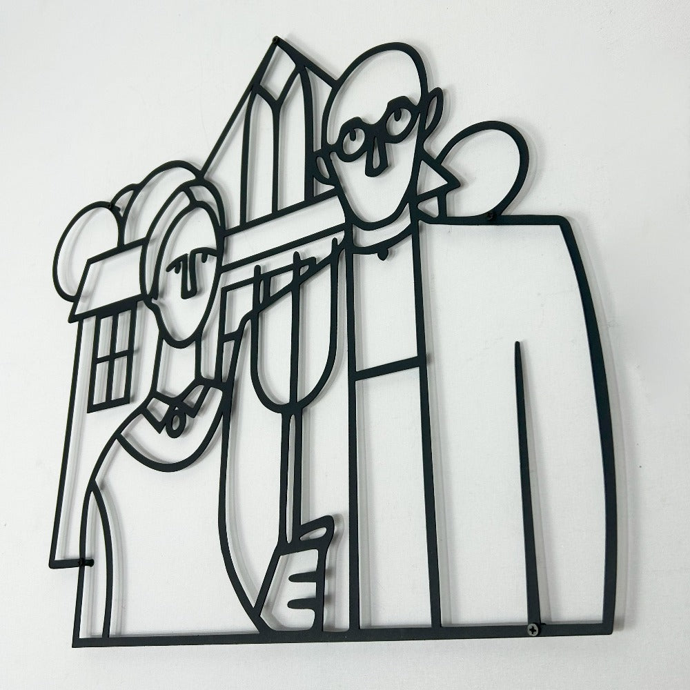 A side view of the American Gothic metal wall art, emphasizing the three-dimensional aspects of the black metal design and its intricate craftsmanship.