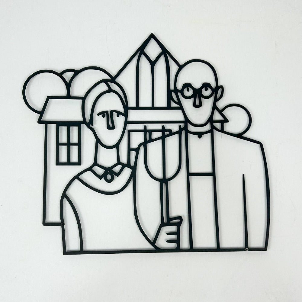 Close-up view of black metal wall art inspired by the American Gothic painting, highlighting the couple and farmhouse in a clean line art style.