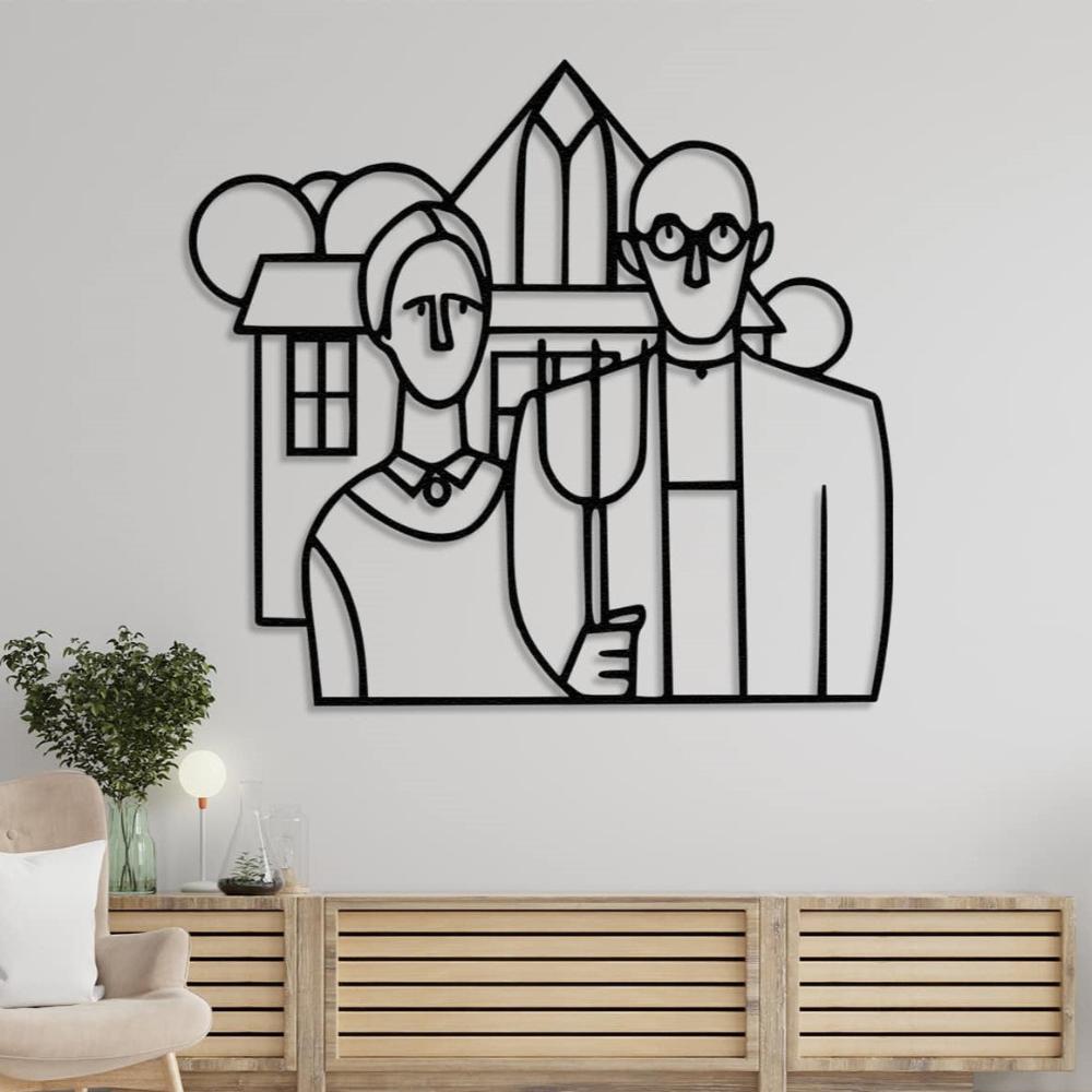 A large black metal "American Gothic" wall art mounted on a white wall above a light wood console table, complementing the modern decor with plants and decorative lights.