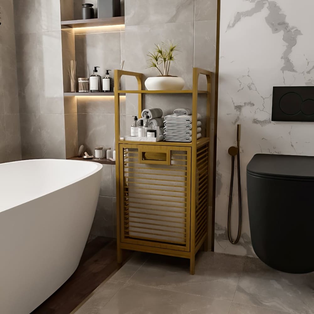 Bamboo bathroom cabinet positioned next to a modern freestanding bathtub, styled with towels, toiletries, and a decorative plant on top, creating a spa-like ambiance