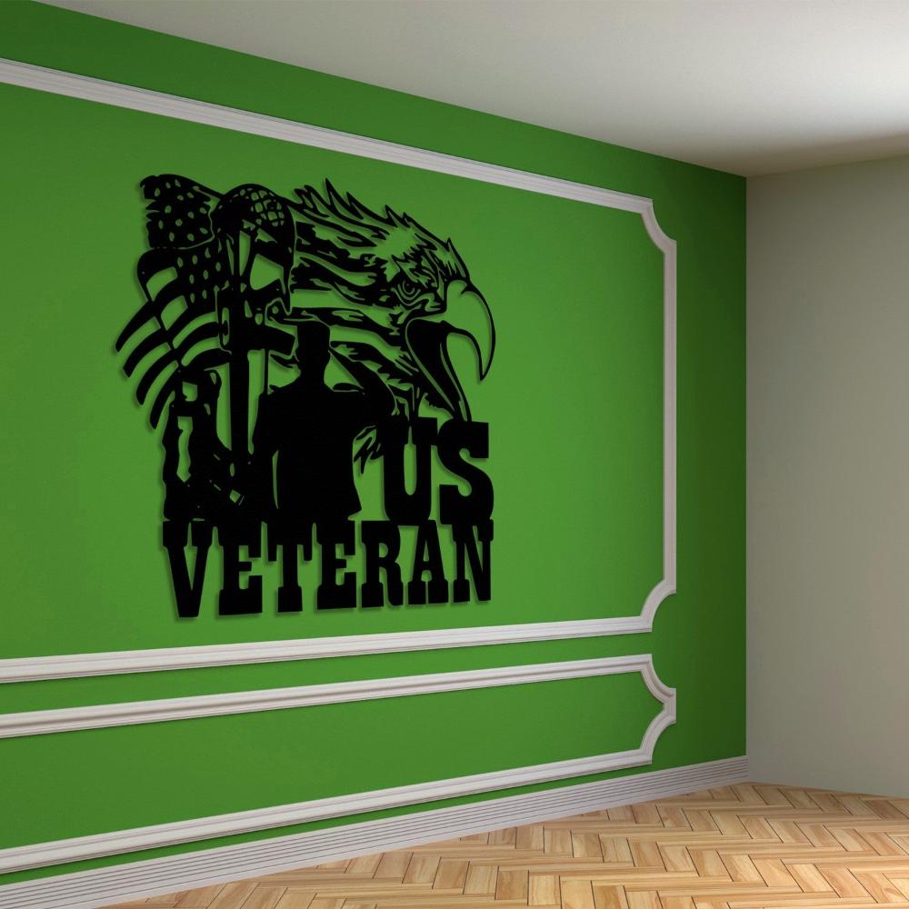 Black metal US veteran wall art showcasing a bald eagle, American flag, and a saluting soldier silhouette, mounted on a vibrant green wall with decorative molding, above a wooden parquet floor.