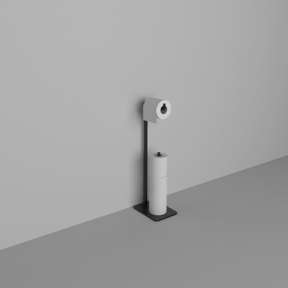 A modern black toilet paper holder stand holding three rolls, positioned against a plain gray wall, showcasing its clean and contemporary style.