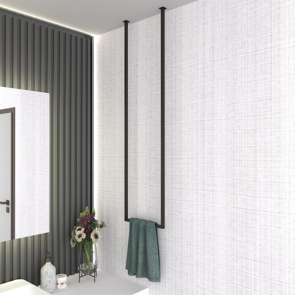 Ceiling-mounted towel rack in a modern bathroom with a white textured wall, holding a green towel for a minimalist aesthetic.