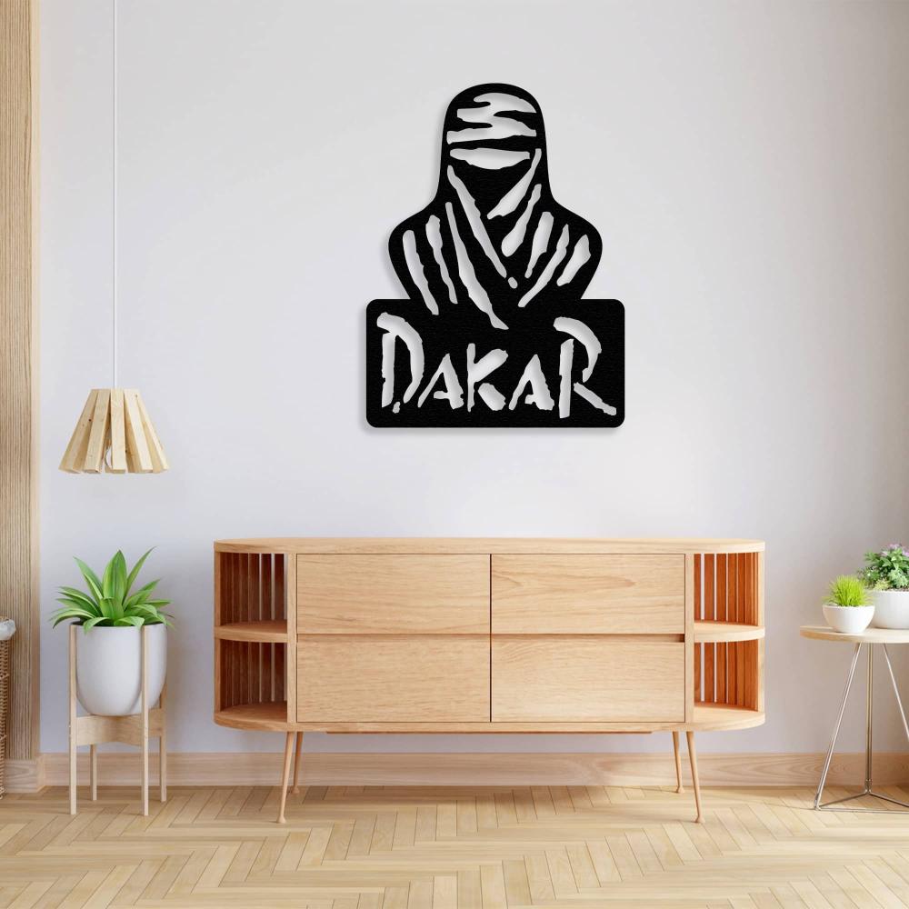 Dakar Rally black metal wall art featuring a desert-inspired design mounted above a modern wooden console table, complemented by minimalist decor, indoor plants, and a wooden pendant light in a bright living room.