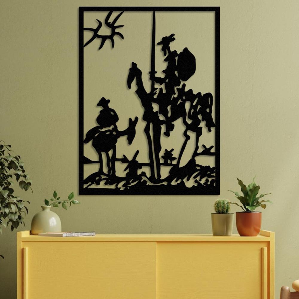 Don Quixote metal wall art featuring a silhouette of Don Quixote on horseback alongside Sancho Panza, with windmills in the background, mounted on a light green wall above a vibrant yellow console table decorated with plants and a small vase.