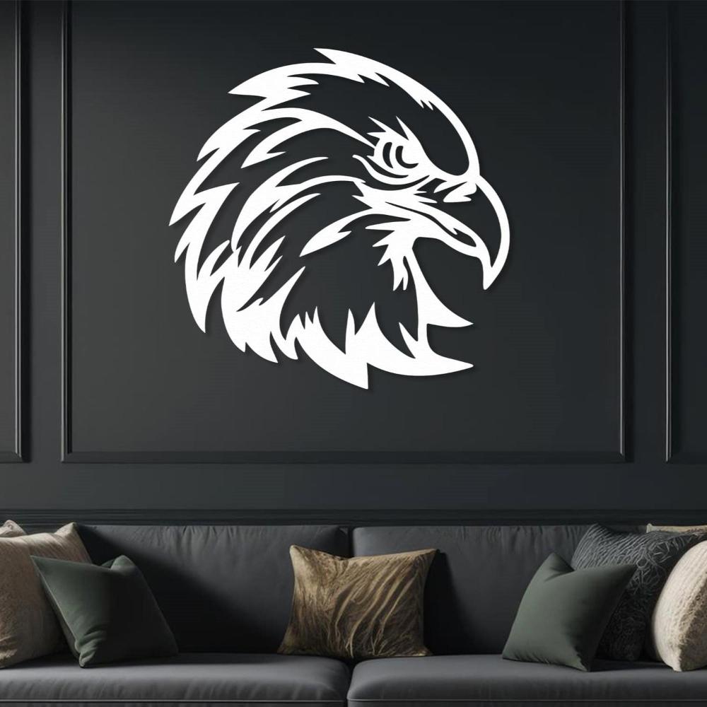 White eagle head metal wall art mounted on a dark green wall above a sofa, creating a bold and modern statement