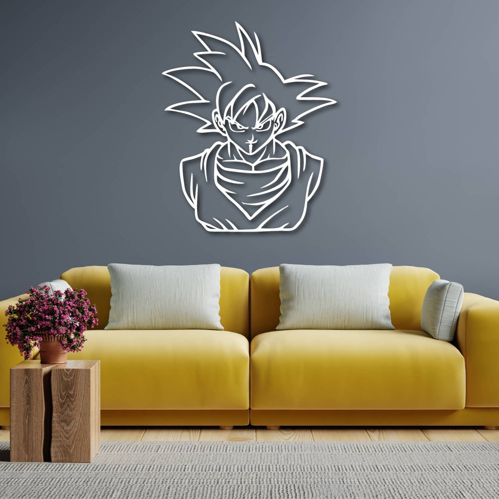 White metal wall art of a stylized character with spiky hair and a determined expression, mounted on a gray wall above a yellow couch with white cushions. A wooden table with a potted plant is positioned on the left side.