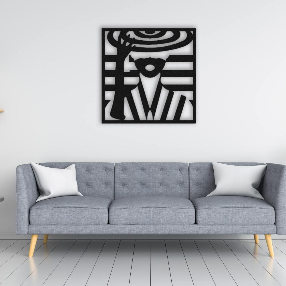Lady with Hat metal wall art displayed above a modern gray sofa, showcasing its bold and stylish design as a centerpiece in a minimalist living room.