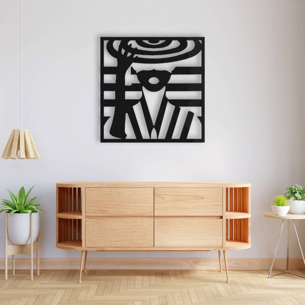 Lady with hat metal wall art in black, mounted above a stylish wooden console table, complemented by a modern pendant light, potted plants, and minimalist decor.