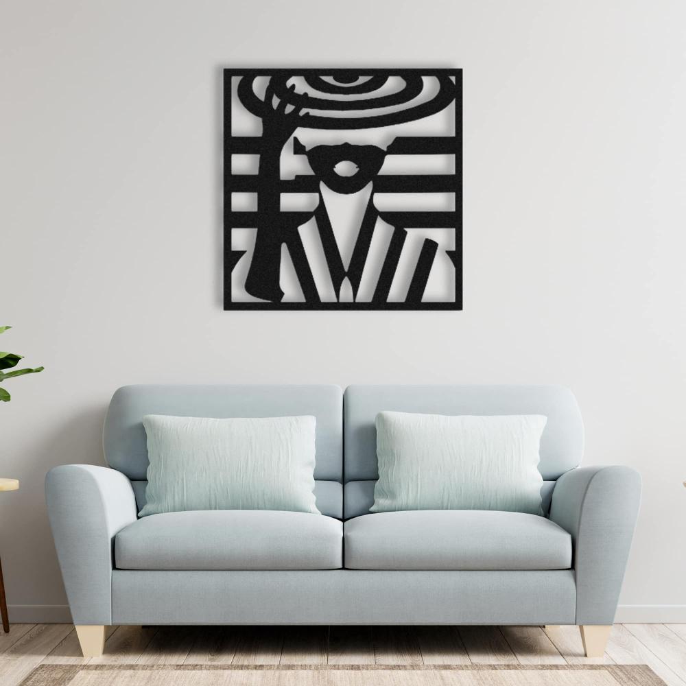 Elegant metal wall art of a lady wearing a hat, featuring geometric cutouts, displayed above a light blue sofa in a modern living room.