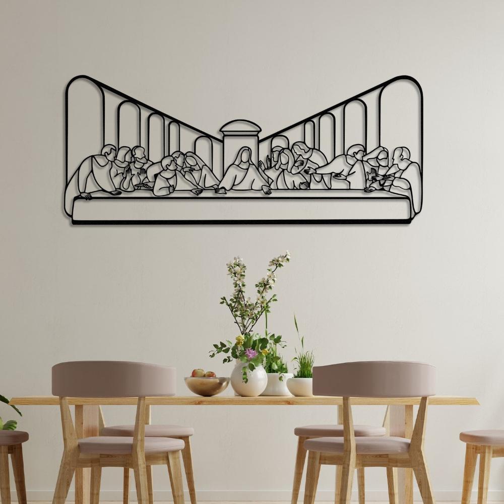 Black metal wall art featuring "The Last Supper," elegantly displayed on a beige wall above a wooden dining table with chairs and a centerpiece of decorative vases and flowers.