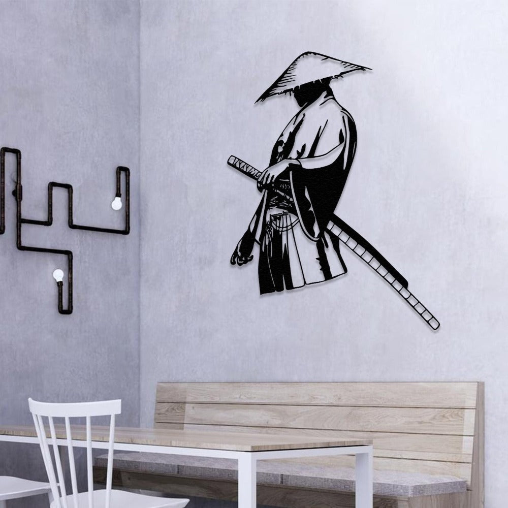 Lonely samurai metal wall art displayed on a light gray textured wall above a wooden dining bench, paired with a minimalist white chair and industrial-style wall decor.