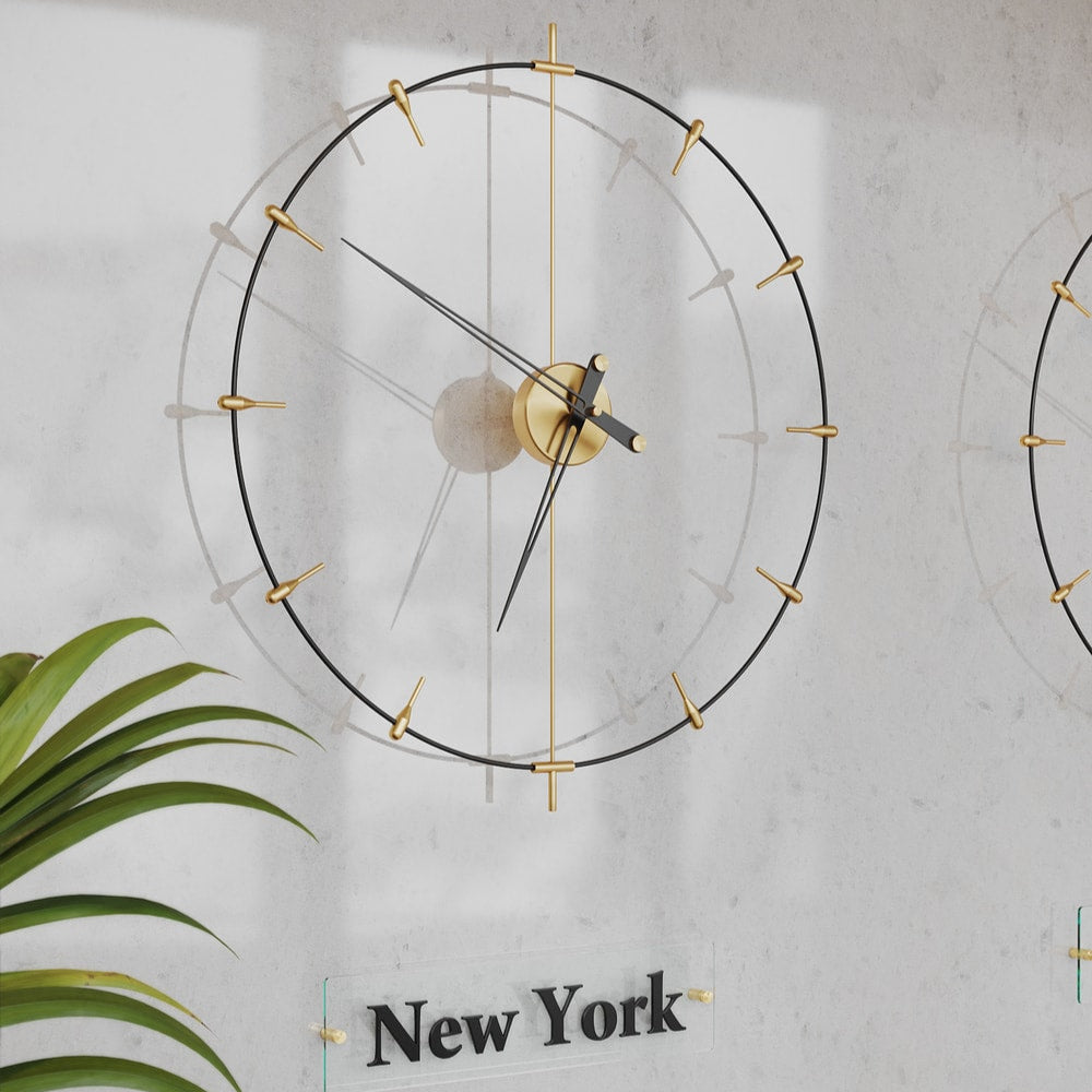 modern world clocks hanged on the lobby wall and there is newyork amblem under it.
