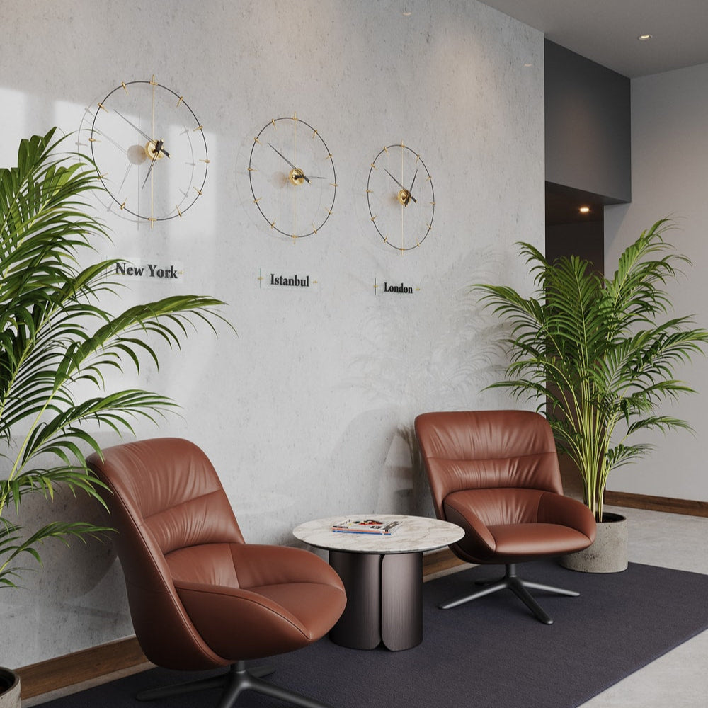 modern world clocks hanged on the lobby wall.