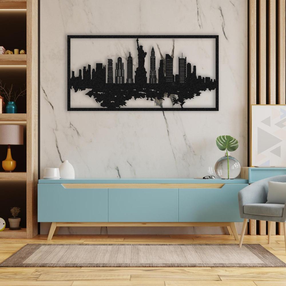 Black metal America silhouette wall art featuring iconic New York City landmarks, including the Statue of Liberty, displayed on a marble wall above a modern teal console table in a stylish living room.