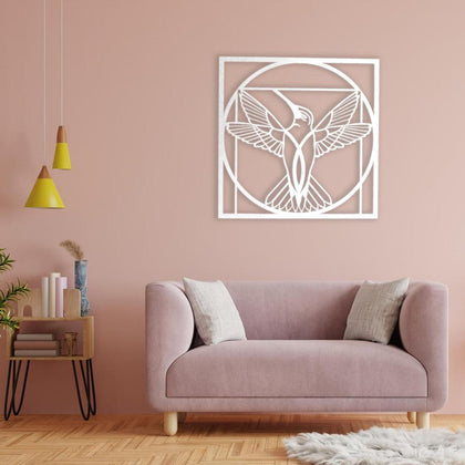 White Hummingbird Round Silhouette Metal Wall Art in a living room