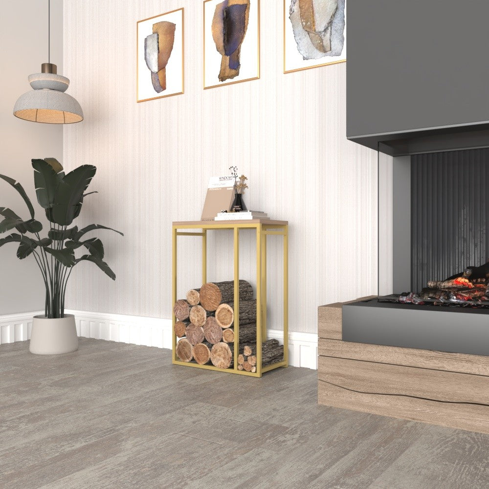 A minimalist metal log rack with a gold frame and wooden top, showcased in a warm interior with modern design elements