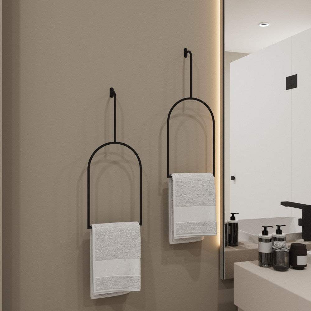 Minimalist towel rings in a modern bathroom with neutral tones, showcasing their stylish and space-saving design.