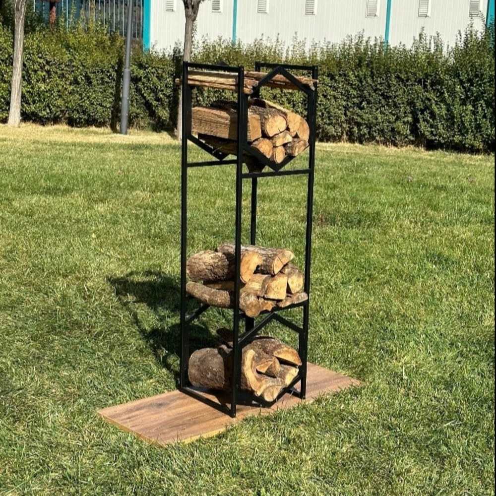 Black hexagonal metal log holder in a backyard setting, showcasing its modern design with firewood neatly arranged.