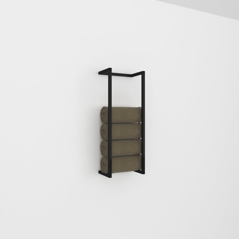 A black modern wall-mounted towel and blanket storage rack holding four neatly rolled green towels, showcased against a plain white wall for a minimalist aesthetic.