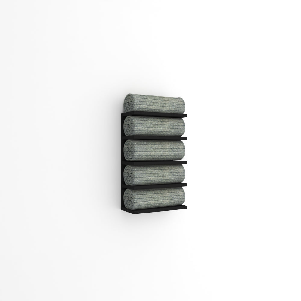 Wall-mounted black towel rack with five tiers, holding rolled green towels against a plain white wall in a minimalist design.