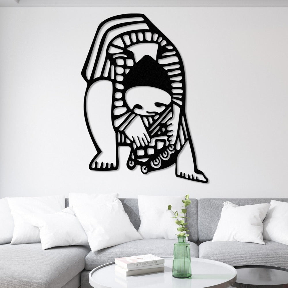 A modern Picasso-inspired wall art piece featuring a child bending down, holding artistic elements, displayed above a sleek gray sofa for an elegant living room decor