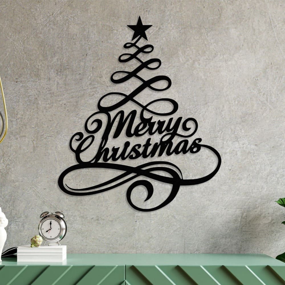 Black metal "Merry Christmas" tree wall art on a textured concrete wall above a green modern console table, featuring a vintage clock and minimalist decor, creating a festive yet contemporary aesthetic.