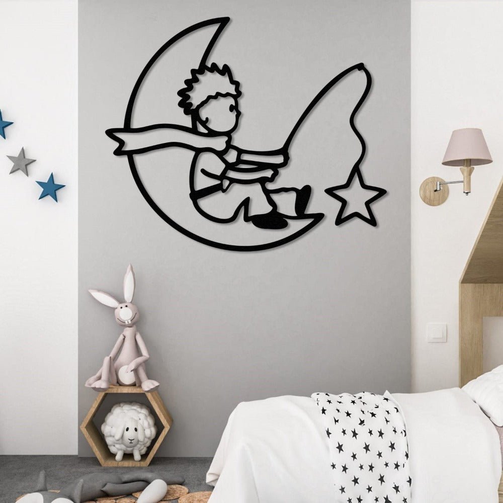 Crescent moon and boy silhouette metal wall art, featuring a star detail, styled in a playful and cozy children’s bedroom setting.
