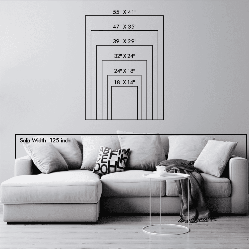 A size chart displaying six rectangular frames of various dimensions from 18" x 14" to 55" x 41", shown above a modern gray sofa for scale.