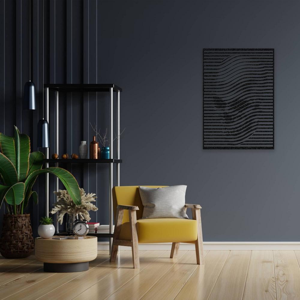 Black skull wall art with a wavy line design displayed on a dark blue wall in a modern room featuring a yellow armchair with a gray pillow, a round wooden coffee table with decor items, and a tall plant in a woven basket. Minimalist shelving and pendant lights enhance the stylish ambiance.