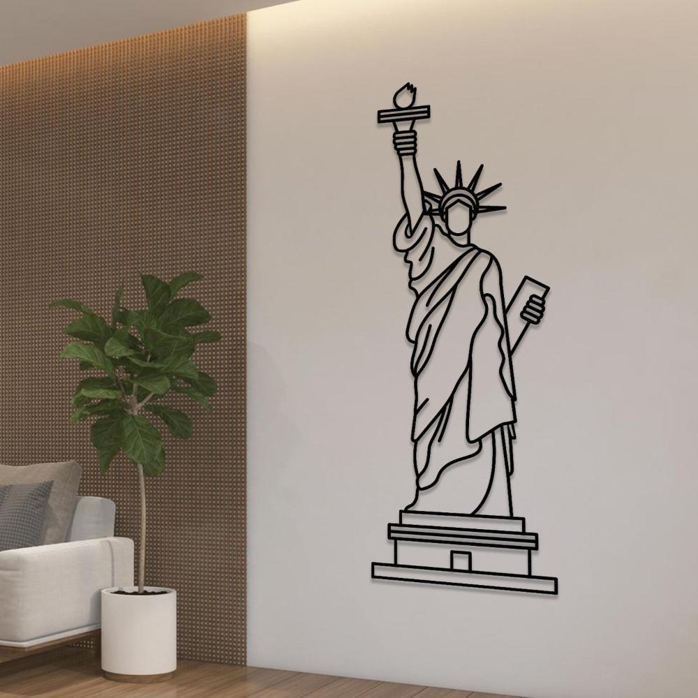 The Statue of Liberty metal wall art displayed on a textured wall in a luxurious living room. The piece captures the essence of freedom and adds a timeless charm to the setting.
