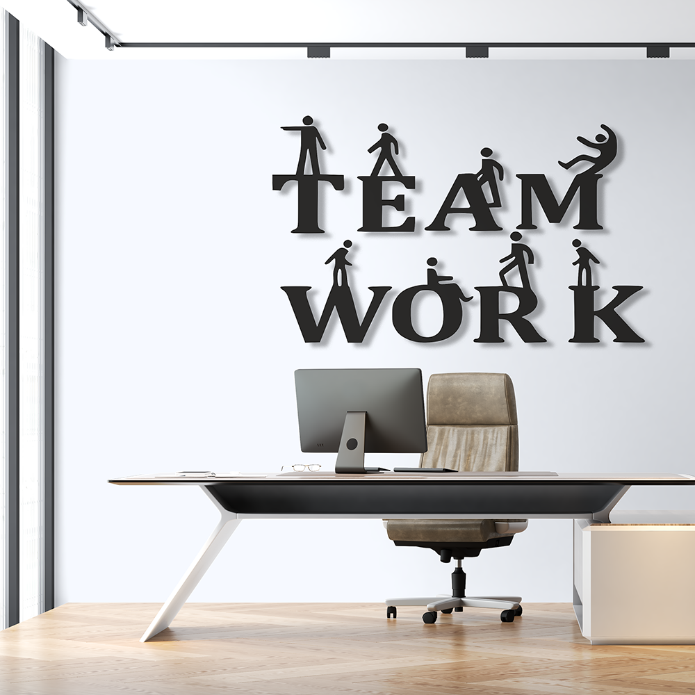 Modern office setup with a desk, chair, and 'Team Work' wall decoration.