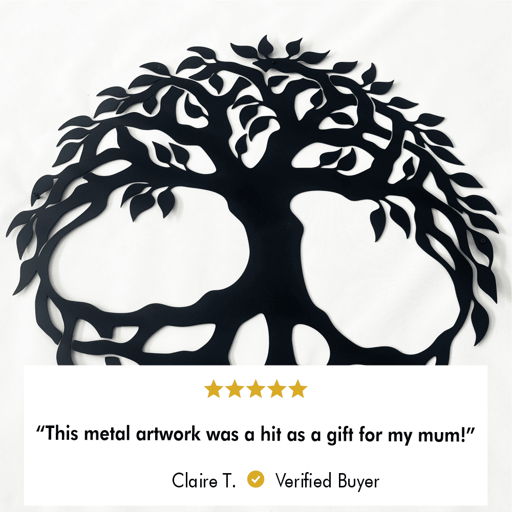 Close-up view of a black metal Tree of Life wall art featuring intricate leaf and branch details, paired with a 5-star review highlighting its success as a thoughtful gift for a mother.