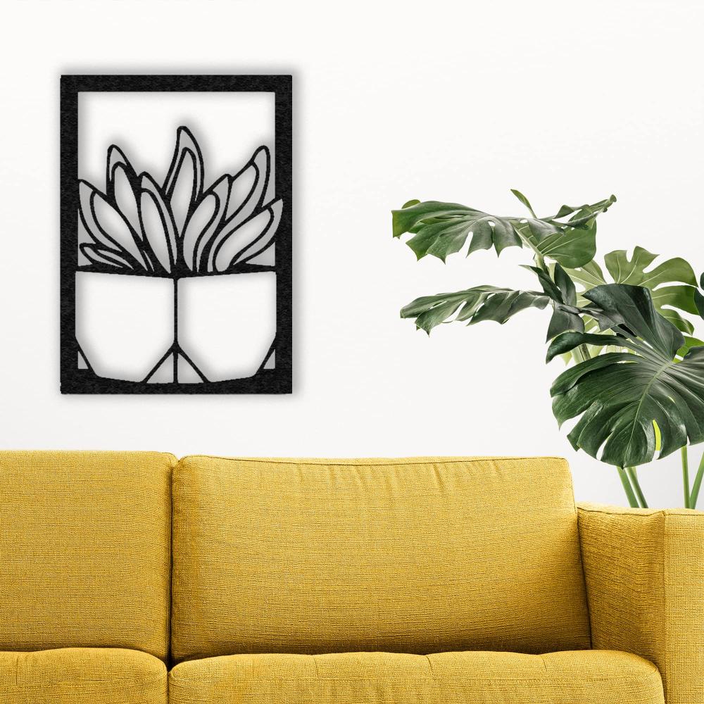 A vibrant setup with a mustard-yellow sofa and a black "Vase with Succulent" metal wall art on a white wall, paired with a leafy green monstera plant for a fresh look.