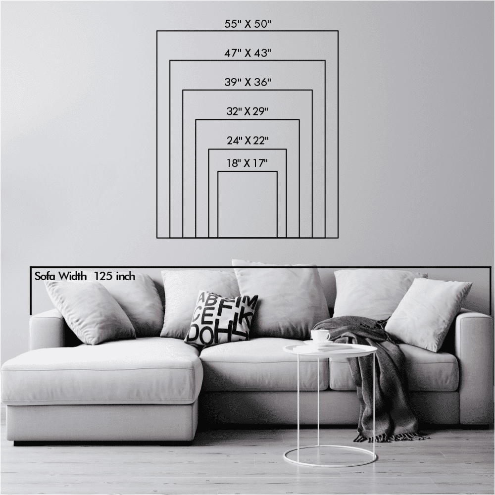 Size chart for wall art showing dimensions ranging from 18"x17" to 55"x50", positioned above a white sofa with a width of 125 inches, providing a visual guide for wall art sizing in a living room setting.