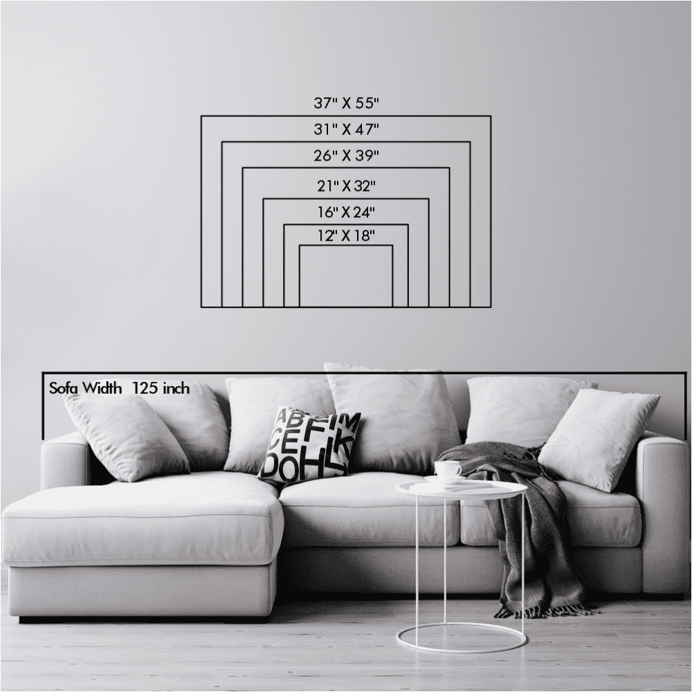 Wall size chart illustration showing various rectangular dimensions from 12" x 18" to 37" x 55", aligned with a 125-inch sofa for scale in a modern living room setup.