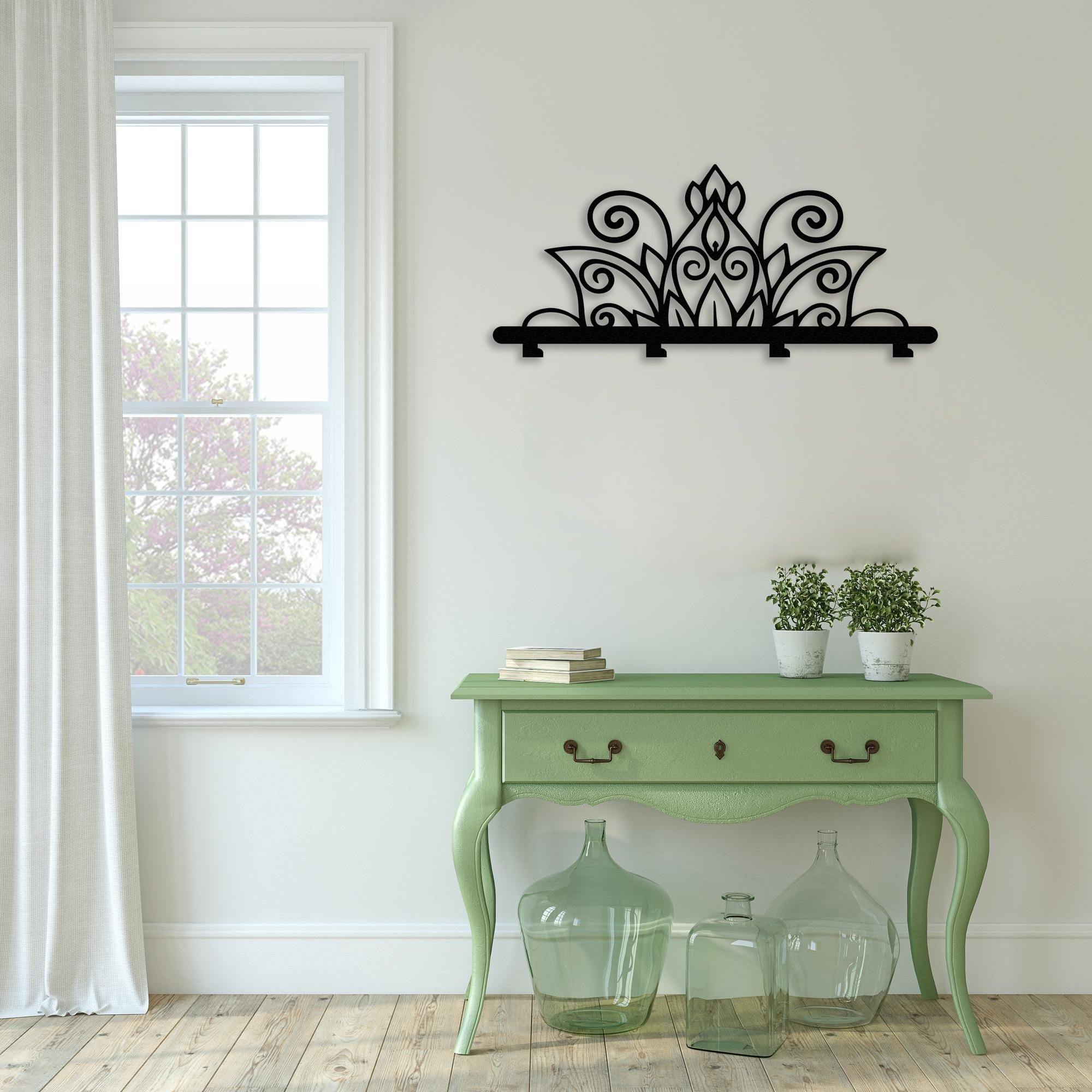 wall rack with mandala metal green table