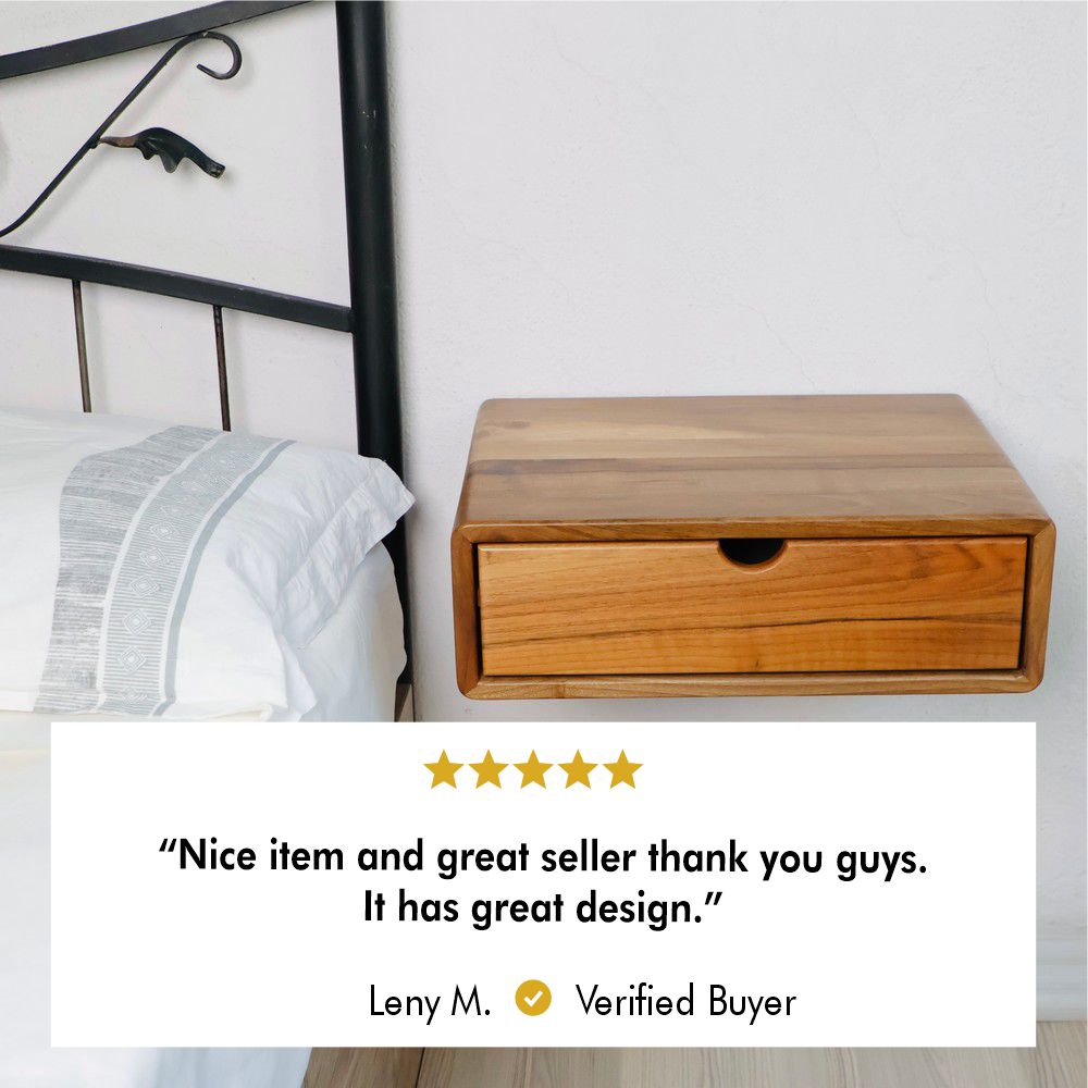 Walnut wall-mounted wooden bedside table with a closed drawer, featuring a smooth natural wood grain finish. Positioned beside a bed, it offers a modern and space-saving storage solution.