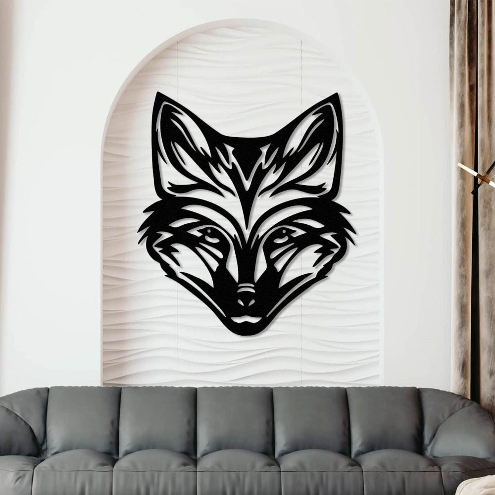 Black metal wall art featuring a detailed fox head design, mounted on a white textured panel within an arched wall alcove. Below, a sleek gray upholstered sofa complements the elegant and modern interior decor.