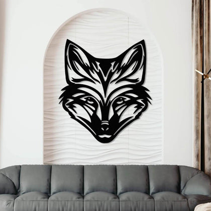 Black metal wall art featuring a detailed fox head design, mounted on a white textured panel within an arched wall alcove. Below, a sleek gray upholstered sofa complements the elegant and modern interior decor.