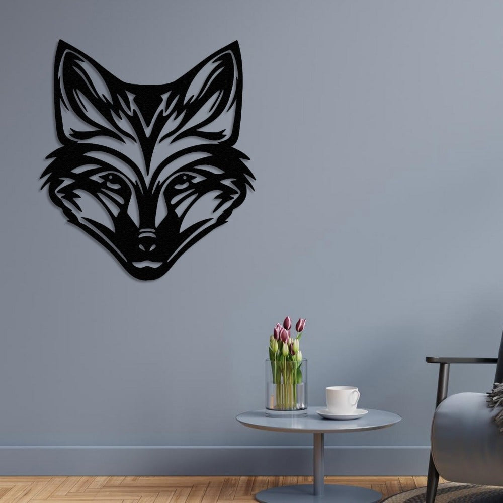 black metal wild fox wall art mounted on a muted gray wall, paired with a small round table holding a glass vase with pink tulips and a white cup, creating a modern and minimalist room design.