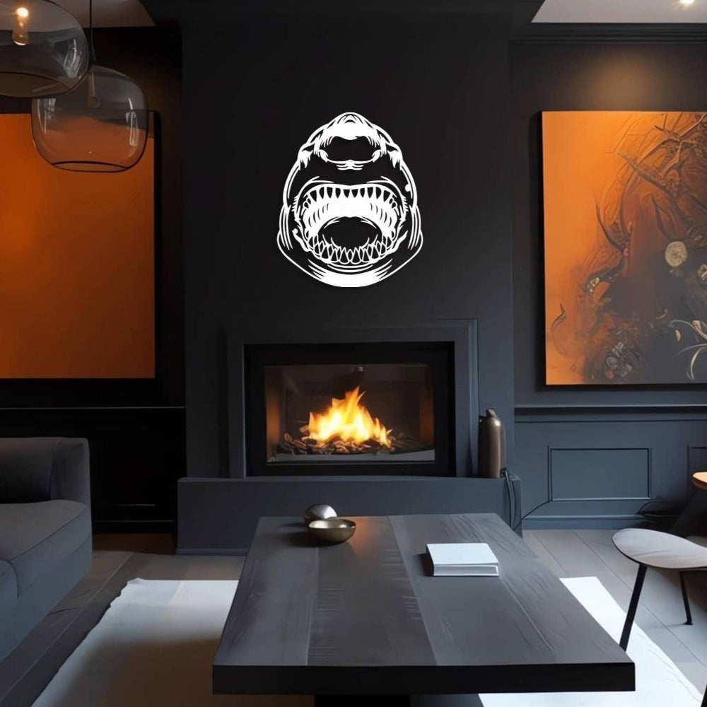 White shark metal wall art above a modern black fireplace in a contemporary living room with orange accents.