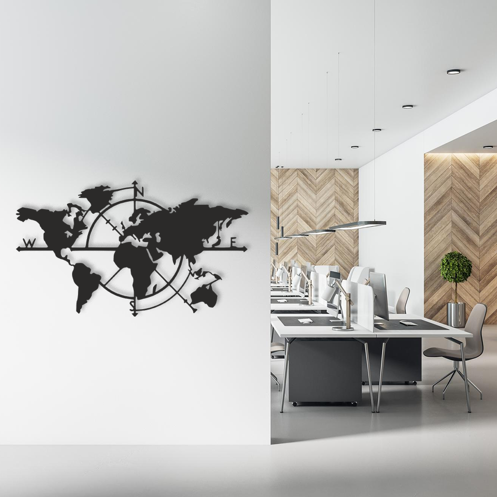 World map wall decor in a modern office setting with desks and chairs.