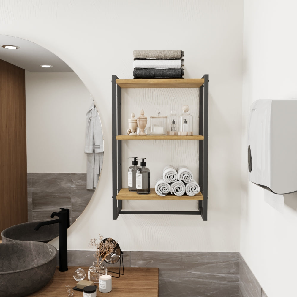 3-tier bathroom shelf and towel holder styled with towels and decorative items.
