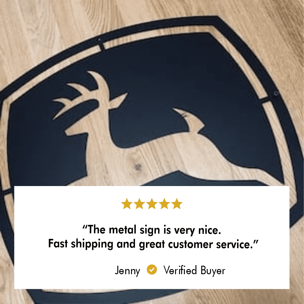 John Deere Deer Logo Metal Wall Art in a garage