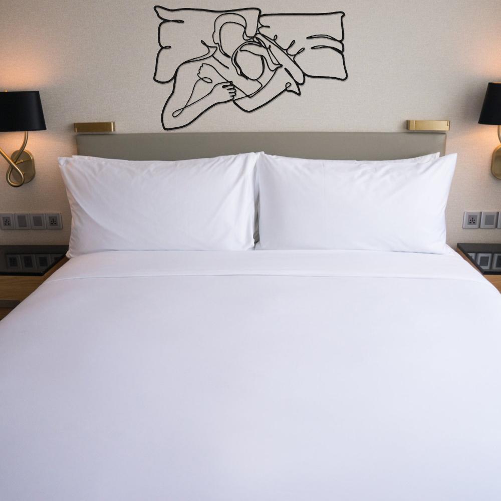 Romantic Lying Couple Line Art Metal Wall Art in a bedroom