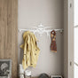 White aircraft silhouette coat rack with wall mounted hooks.