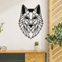 Geometric wolf head metal wall art in white, mounted on a dark gray wall above a light gray modern sofa. The decor is complemented by a pink wireframe side table with a bouquet of white roses and a gold-accented coffee table on a wooden floor.